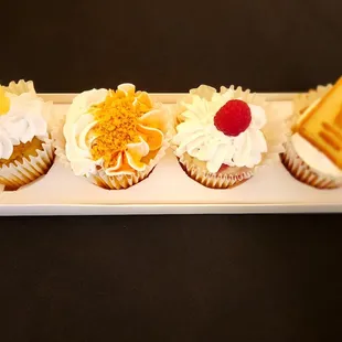 4 Cupcake Flight - lemon poppyseed, orange crush crunch, raspberry almond and butterscotch