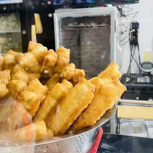 a bowl of fried french fries