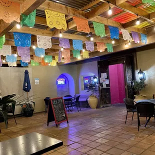 Outdoor seating nearby front entrance