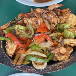 a plate of chicken and vegetables