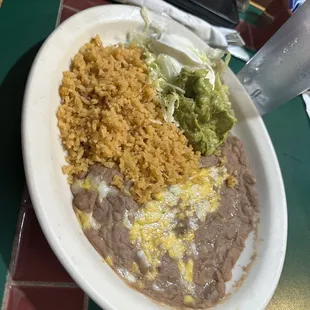 Side of beans, rice, sour cream, and guacamole