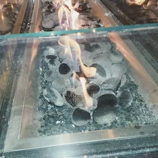 Fire pit table on patio