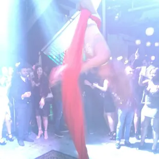 The rope artist on her way down