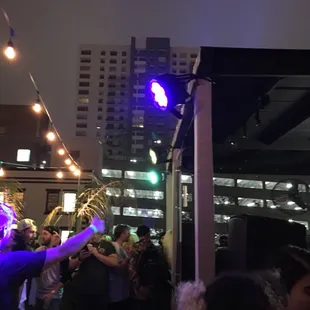 a crowd of people at a party