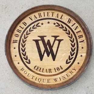 a wooden barrel with the word world market winery on it