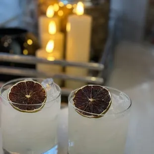 two glasses of grapefruit cocktail