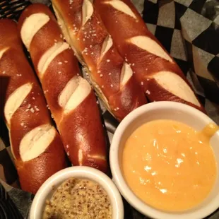 Baked Soft Pretzels with cheese and spicy mustard.