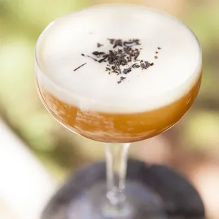 a glass filled with a drink