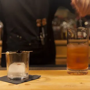 a bartender preparing a drink