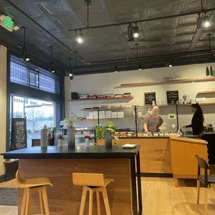 a woman standing in the kitchen