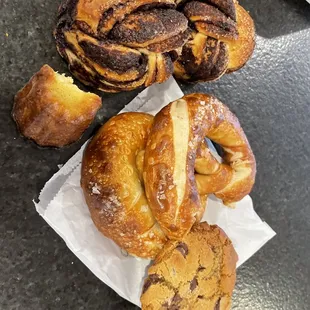Chocolate Bible, 1/2 Canele, pretzels and chocolate chip cookie.