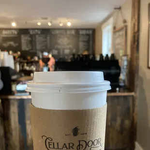 a cup of coffee on a table