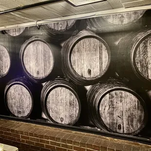 a bunch of wine barrels