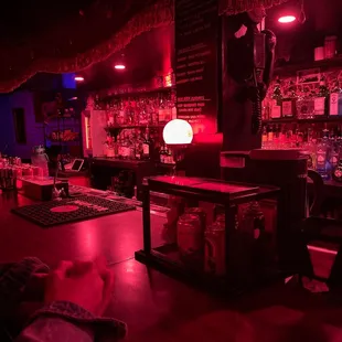 a bar with red lights