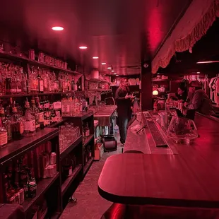 a man standing at the bar