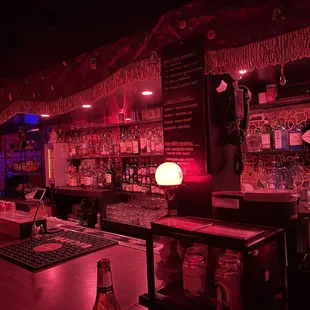 a dimly lit bar area