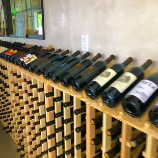 Wine collection along wall entry