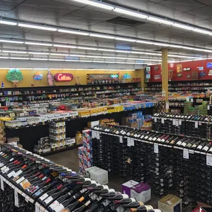 rows of wine bottles in a store