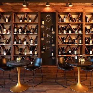 a wine cellar with wine bottles on shelves