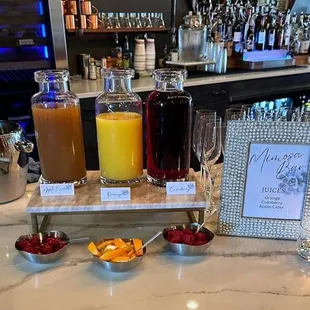 a bar with a variety of drinks