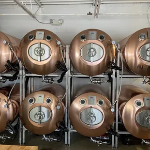 a row of copper tanks