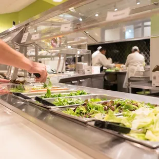 a chef preparing food in a kitchen