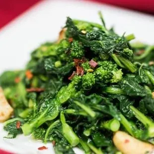 a plate of broccoli and garlic