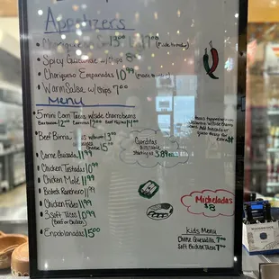a menu on a white board