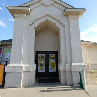 the entrance to a restaurant