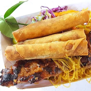 Combo with pancit and two lumpias, $12. Added an extra lumpia for $1. Combo only is $11.
