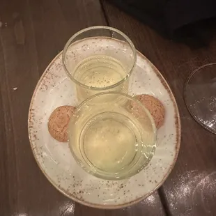 Complimentary limoncello dessert shots w almond cookies