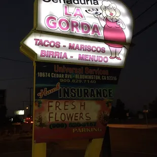 a neon sign for a restaurant