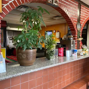 The entrance of the restaurant--place order and kitchen area.