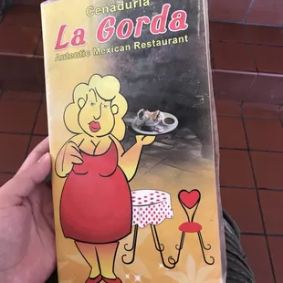 a woman holding a plate of food