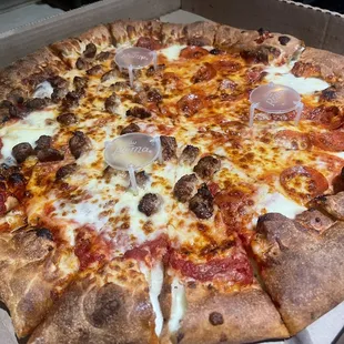 Stuffed crust half pepperoni half Italian sausage