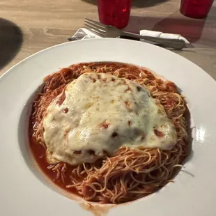 Chicken parm dinner with angel hair pasta