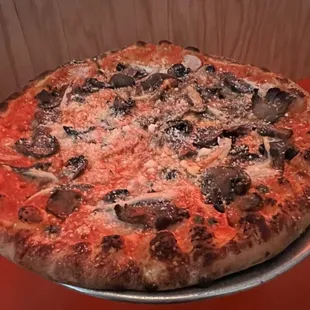 Salty pizza with mushrooms