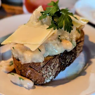 August 23, 2024; HH White Bean Crostini ($4).