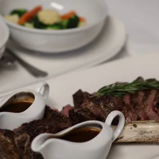 a plate of steak and gravy