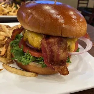 Burger with cheddar cheese and bacon. Fries were also delicious!