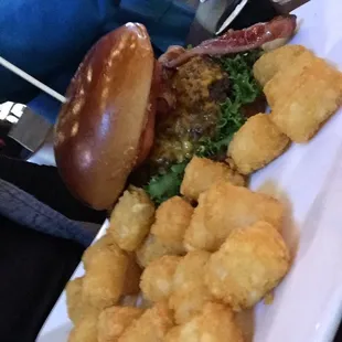 Peanut butter burger with tator tots instead of fries.