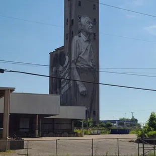 Guido Van Helten mural of local Lee Estes is right across the street. So cool.