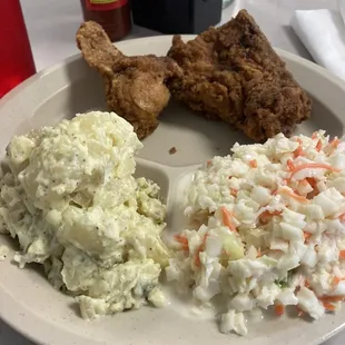 Fried chicken with potato salad and coleslaw