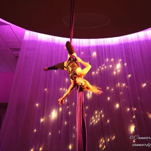 Aerialist Kat Boston of Rebel Aerial flying for The Glow Gala