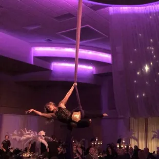 Aerialist Kat Boston of Rebel Aerial flying for The Glow Gala