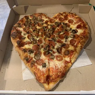 Heart shaped pizza for Valentine&apos;s Day!