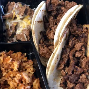 Carne Asada Tacos with Spanish rice and refried beans