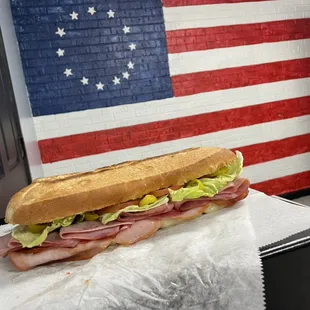 Ambub                   (Italian hoagie) Ham Salami Pepperoni Capicolla Provolone Lettuce Onion Tomato Hot pepper rings