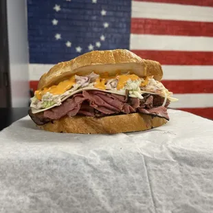 G Babe  hot Pastrami Swiss cheese                           Coleslaw               Russian dressing              on Italian or Rye