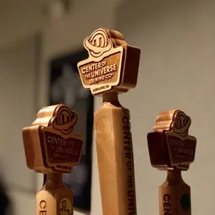 three beer taps